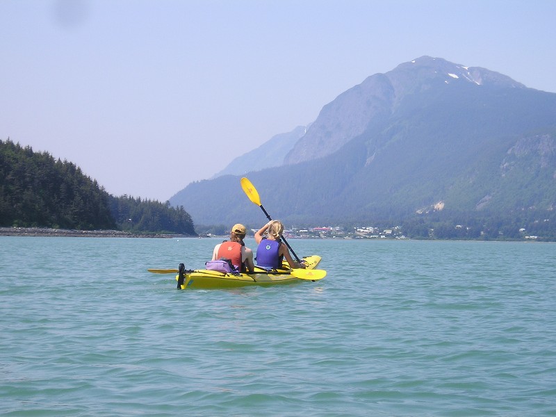 Paddle tandem kayaks just outside of Haines, AK